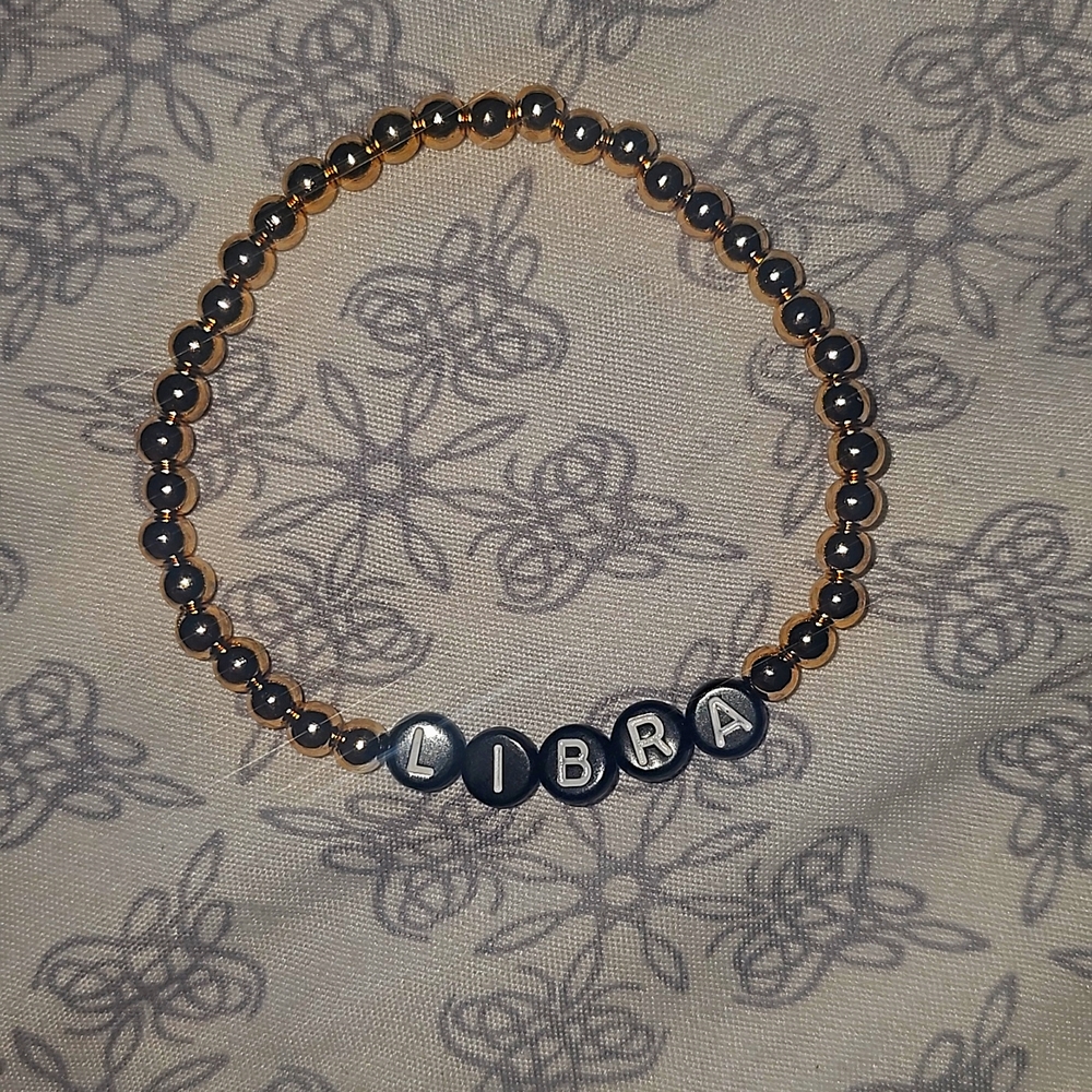 Gold beaded libra bracelet